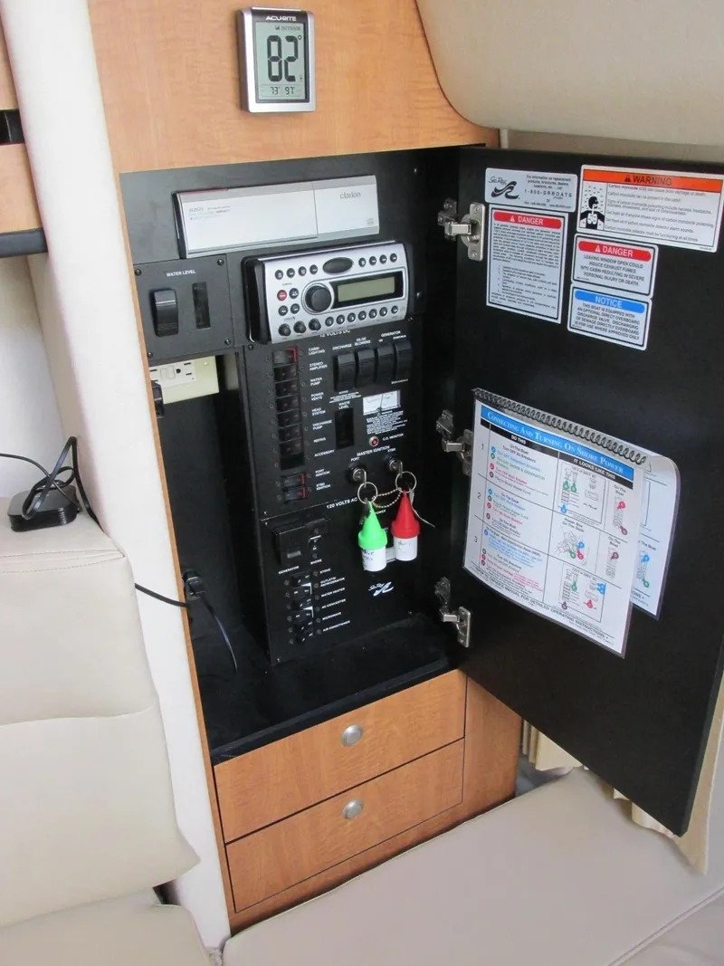 Slide: The Image of Electrical control panel of 2006 Sea Ray 300 Sundancer. - 28