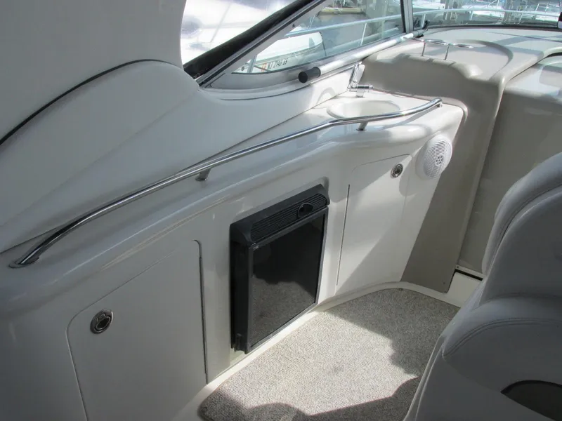 Slide: The Image of Interior of 2006 Sea Ray 300 Sundancer with sink and fridge. - 5