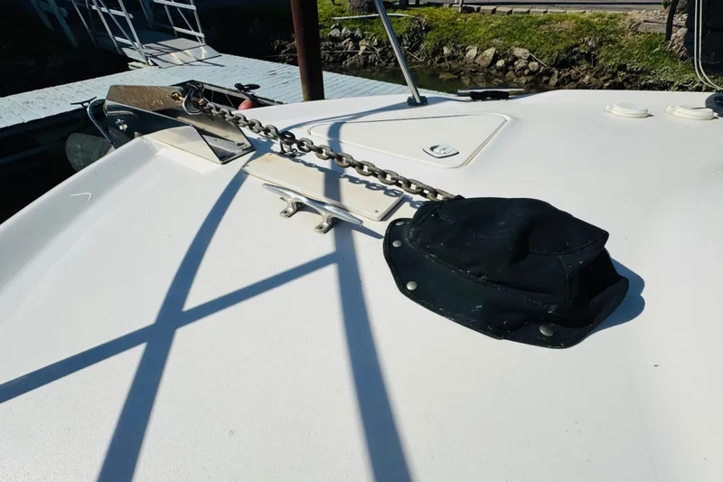 Slide: The Image of Bow of 2000 Sea Ray 400 Sedan Bridge with anchor chain and cover. - 17