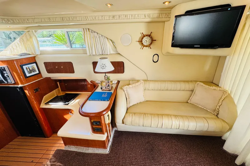 Slide: The Image of Luxurious interior of a 2000 Sea Ray 400 Sedan Bridge with cozy seating and modern amenities. - 42