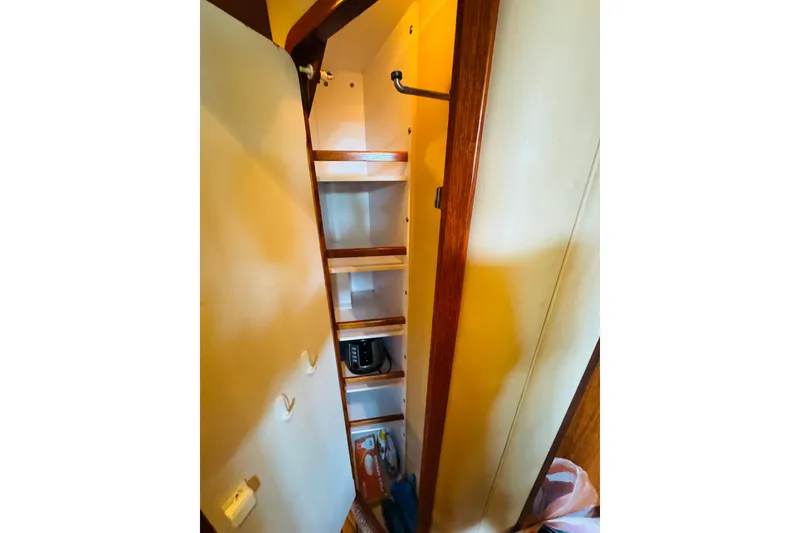 Slide: The Image of Interior storage space on a 2000 Sea Ray 400 Sedan Bridge yacht. - 60