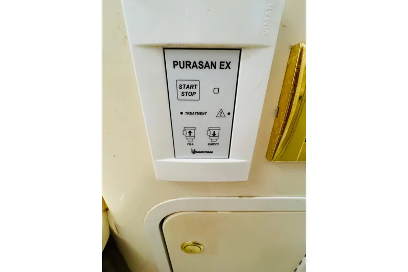 Slide: The Image of Control panel of Purasan EX system on 2000 Sea Ray 400 Sedan Bridge yacht. - 67