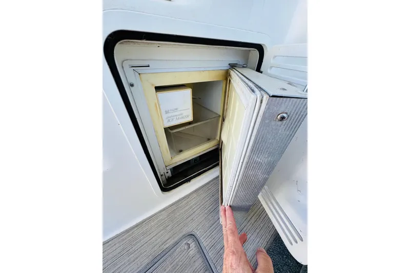 Slide: The Image of Open ice maker on 2000 Sea Ray 400 Sedan Bridge yacht. - 68
