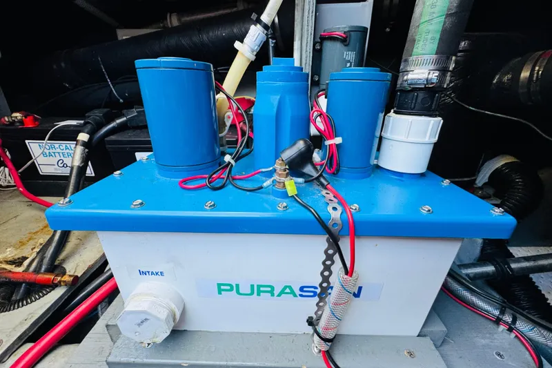 Slide: The Image of Engine room of a 2000 Sea Ray 400 Sedan Bridge with Purasan system. - 75