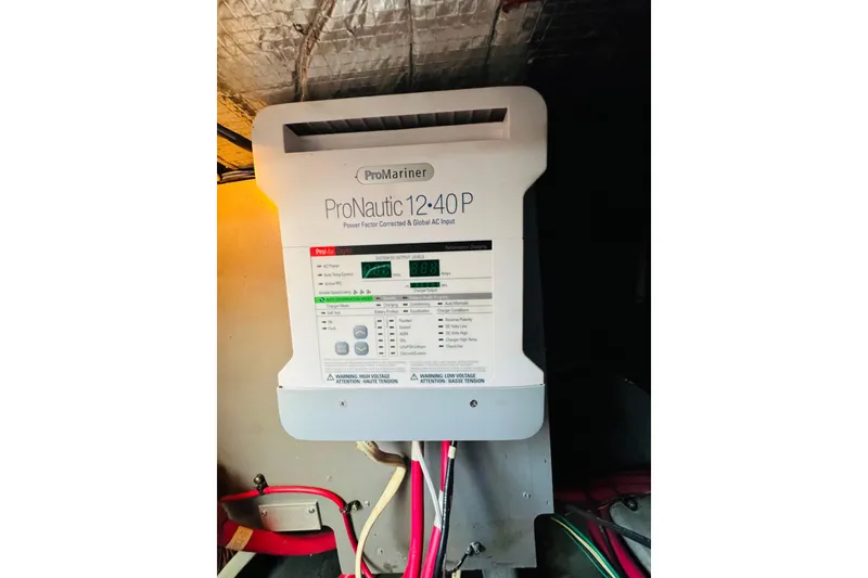 Slide: The Image of ProMariner ProNautic 12-40P charger in 2000 Sea Ray 400 Sedan Bridge yacht. - 76