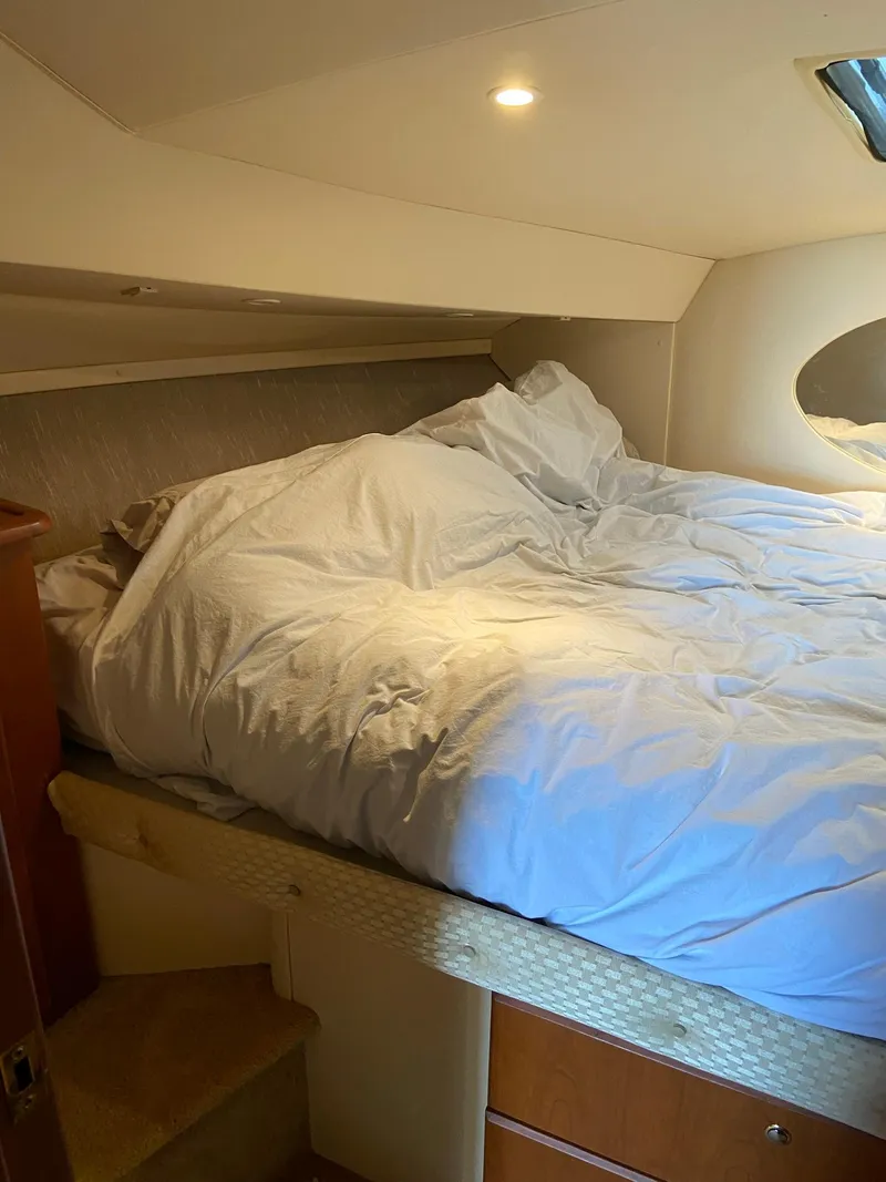 Slide: The Image of Galley on 2005 Silverton 330 Sport Bridge with sink and storage. - 17