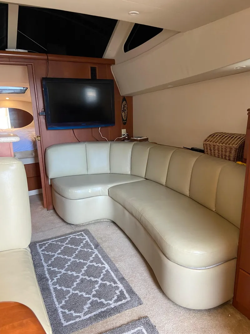 Slide: The Image of 2005 Silverton 330 Sport Bridge at dock, side view. - 23