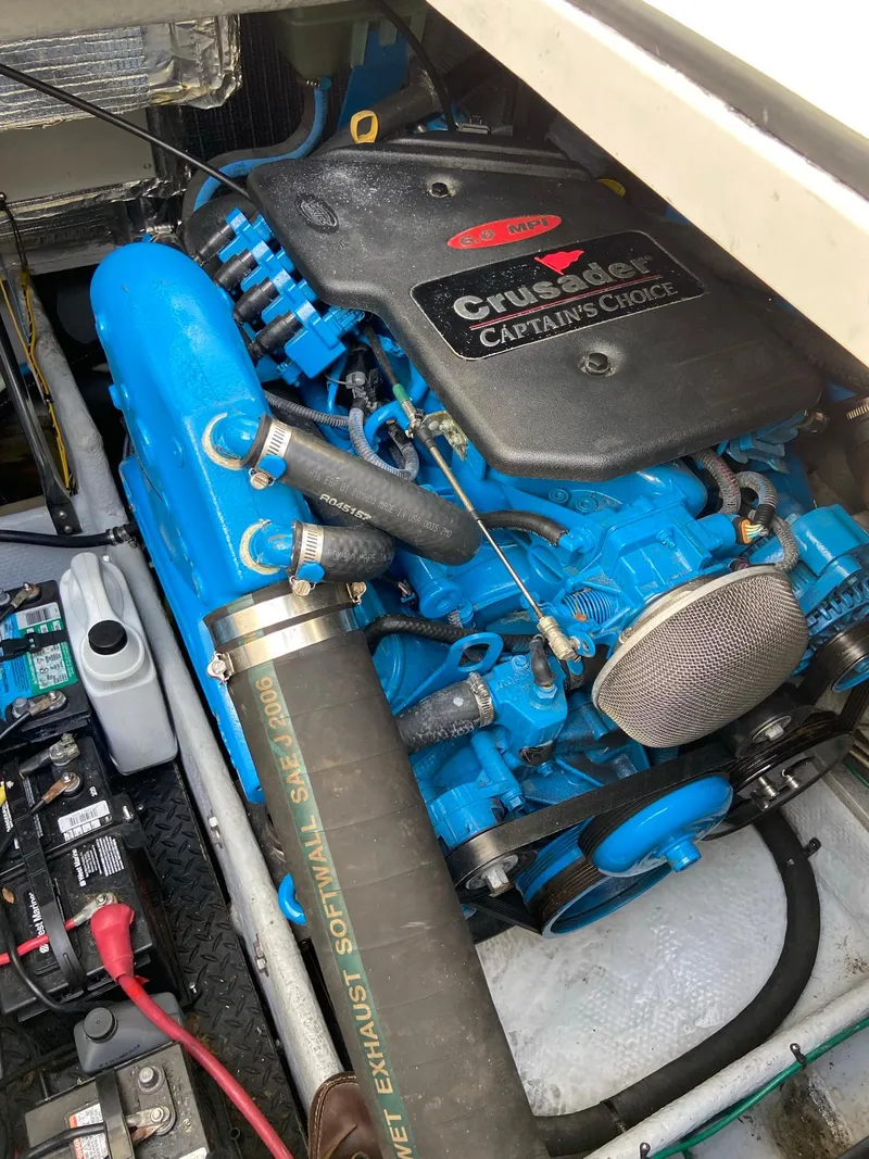 Slide: The Image of Engine compartment of 2005 Silverton 330 Sport Bridge with Crusader engine. - 41