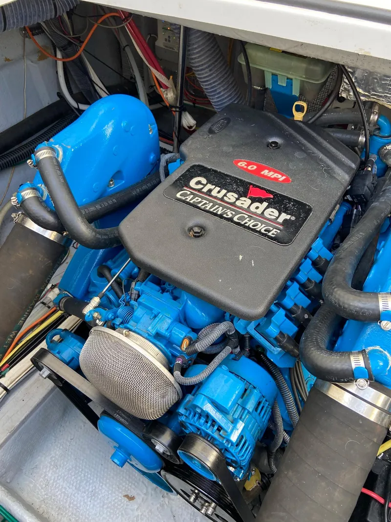 Slide: The Image of Crusader engine in 2005 Silverton 330 Sport Bridge boat. - 42