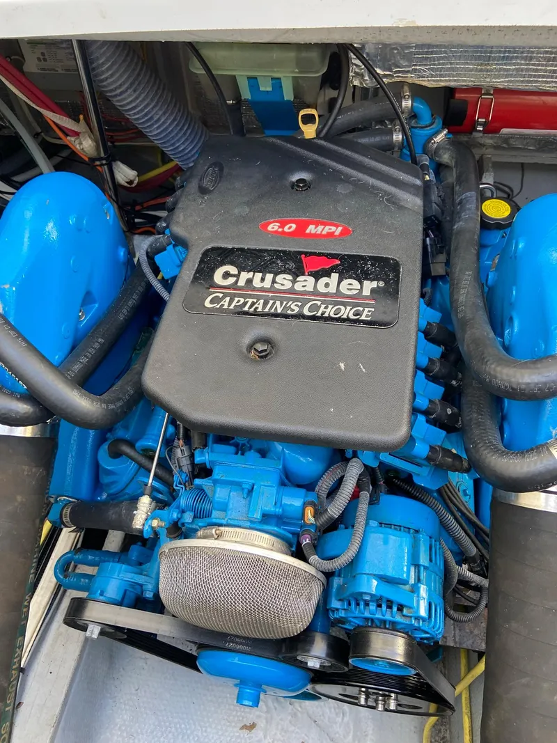 Slide: The Image of Crusader 6.0 MPI engine in 2005 Silverton 330 Sport Bridge. - 45