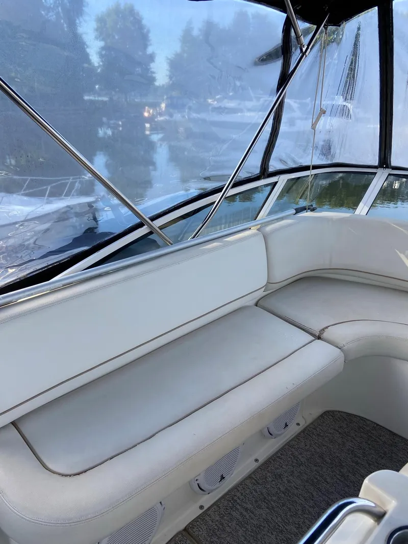 Slide: The Image of 2005 Silverton 330 Sport Bridge yacht at dock. - 9