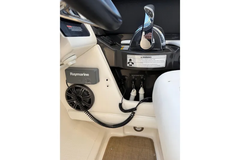 Slide: The Image of Control panel of a 2015 Sea Ray SLX 350 boat with Raymarine equipment. - 10