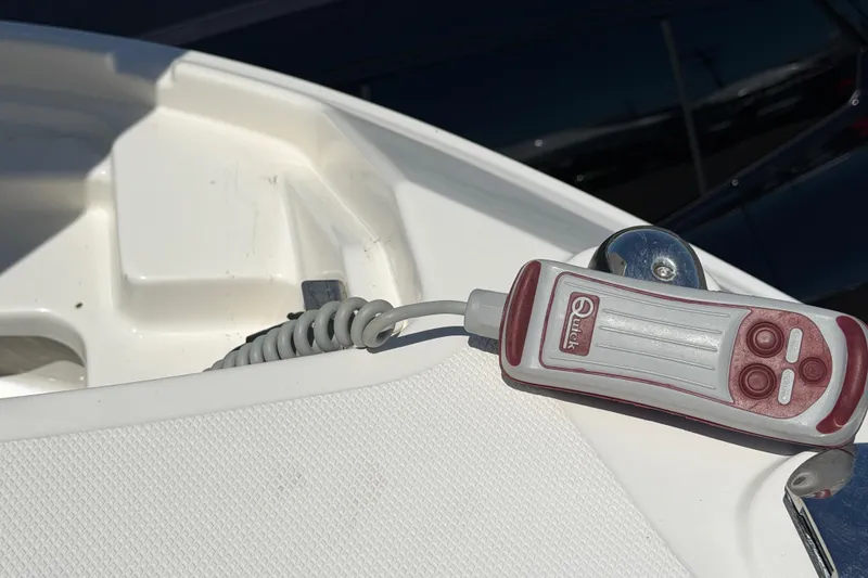 Slide: The Image of Remote control on a 2015 Sea Ray SLX 350 boat deck. - 18