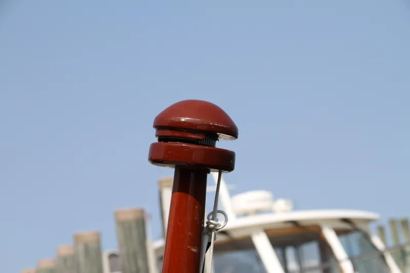 Slide: The Image of Red mooring post with blurred 2005 Limestone 24' Express Cruiser in background. - 9