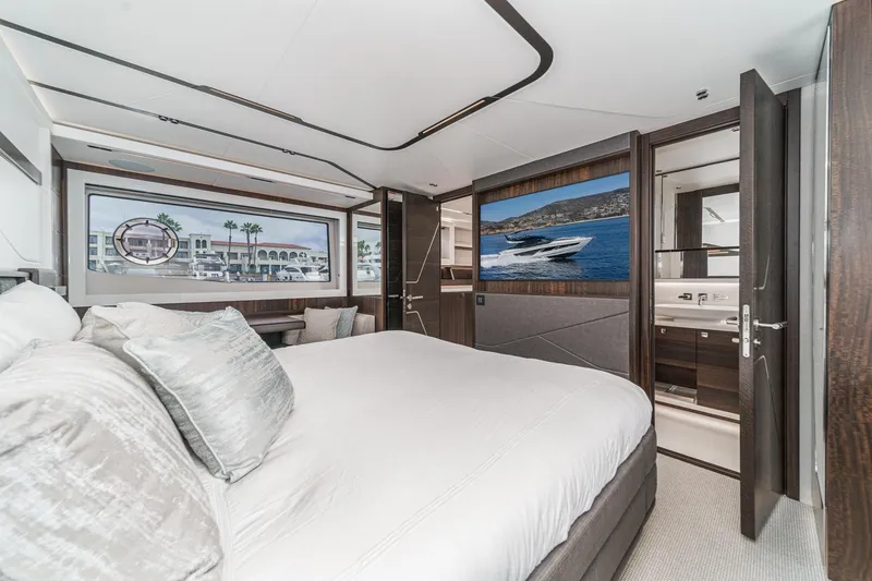 Slide: The Image of Luxurious bedroom interior of 2023 Sunseeker 65 Sport Yacht with modern design and elegant furnishings. - 39