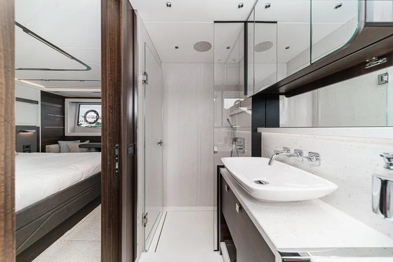 Slide: The Image of Luxurious bathroom and bedroom interior of 2023 Sunseeker 65 Sport Yacht. - 41