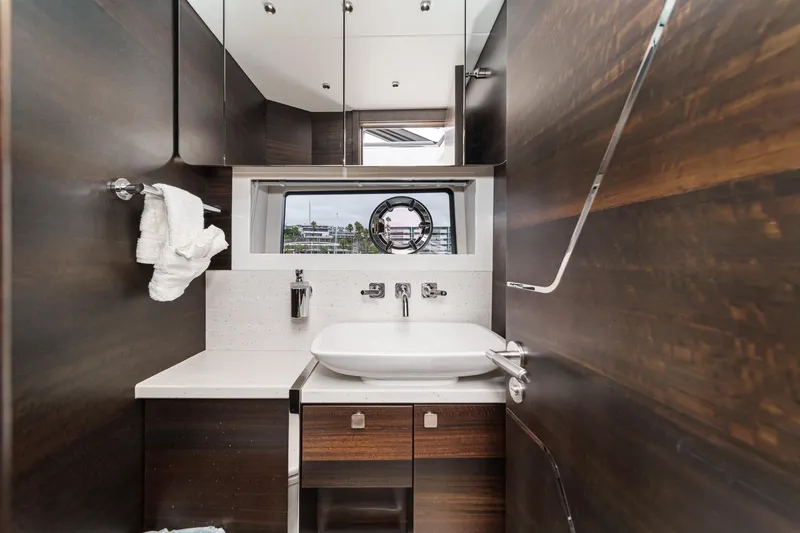 Slide: The Image of Luxurious bathroom interior of 2023 Sunseeker 65 Sport Yacht with modern fixtures. - 49