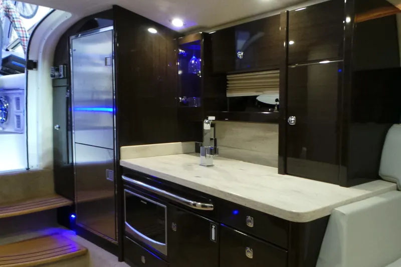 Slide: The Image of Luxurious interior of a 2017 Formula 400 Super Sport yacht kitchen area. - 5