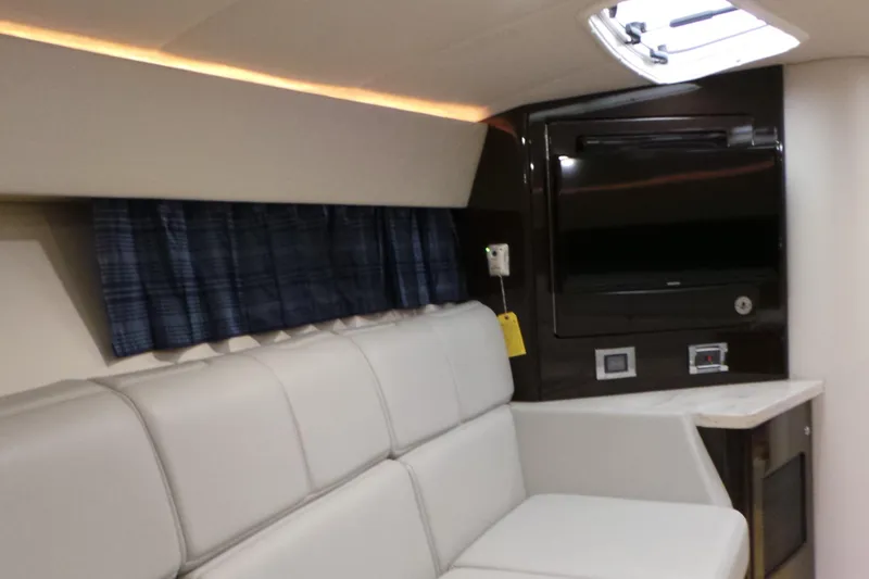 Slide: The Image of Interior of 2017 Formula 400 Super Sport yacht with seating and entertainment system. - 6