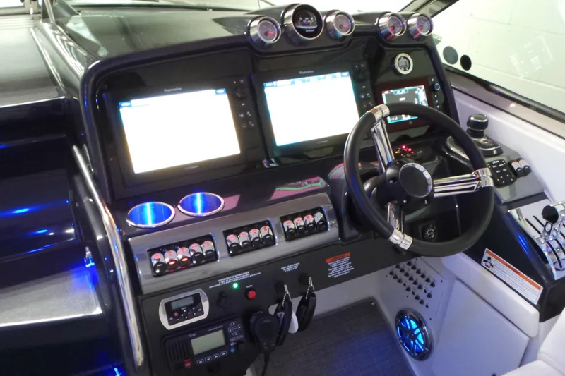 Slide: The Image of Control panel of a 2017 Formula 400 Super Sport boat with advanced navigation displays. - 7