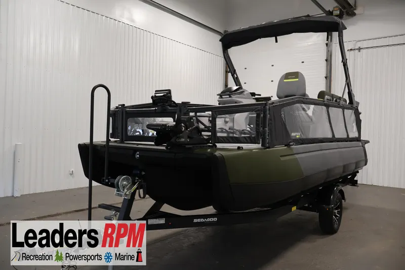 The Image of 2025 Sea-Doo Switch Fish 21 pontoon boat in a showroom. - 1