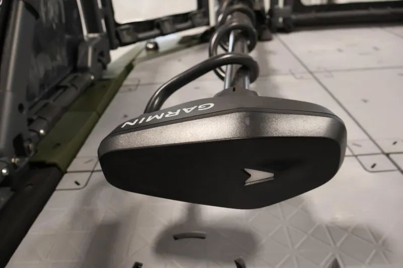 Slide: The Image of Garmin device on 2025 Sea-Doo Switch Fish 21 boat deck, showcasing advanced navigation technology. - 12