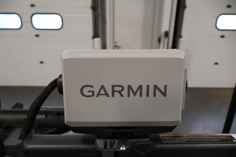 Slide: The Image of Garmin device on 2025 Sea-Doo Switch Fish 21, indoor setting. - 14