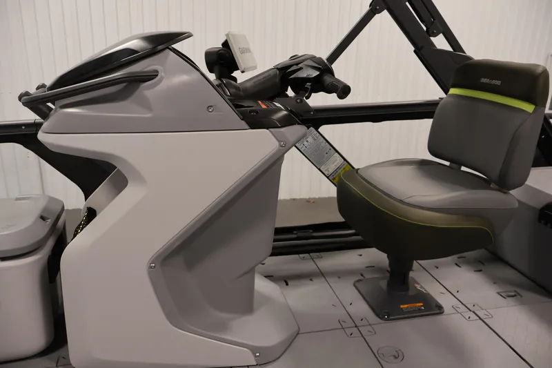 Slide: The Image of 2025 Sea-Doo Switch Fish 21 interior with steering console and seating. - 18