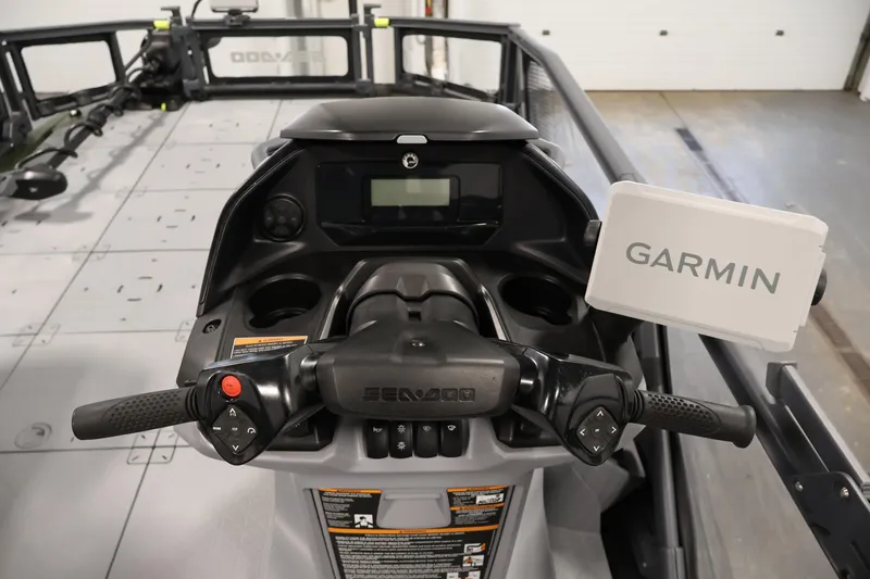 Slide: The Image of 2025 Sea-Doo Switch Fish 21 dashboard with Garmin navigation system. - 19