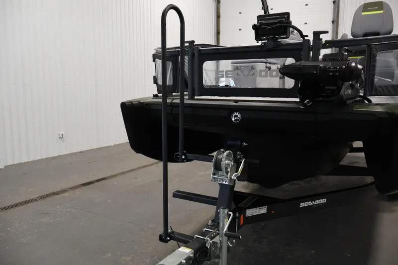 Slide: The Image of 2025 Sea-Doo Switch Fish 21 on trailer in indoor setting. - 37