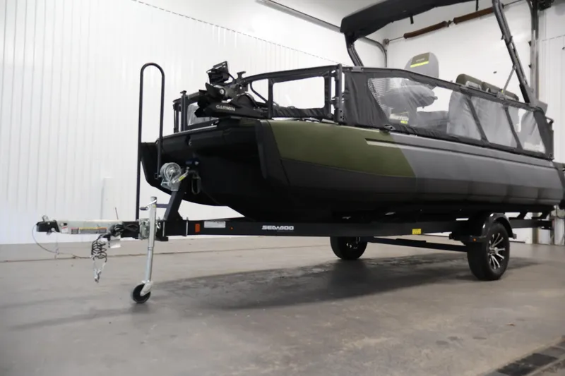 Slide: The Image of 2025 Sea-Doo Switch Fish 21 on trailer in indoor setting. - 39