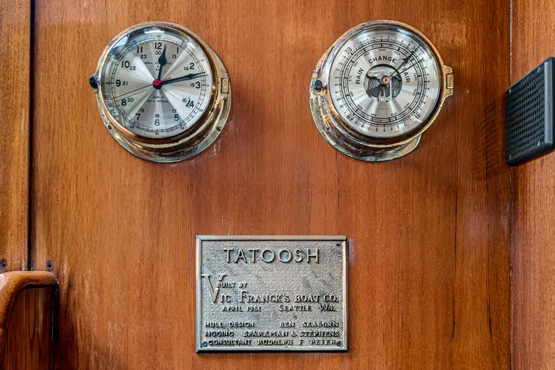 Slide: The Image of Wooden panel with vintage clock, barometer, and Vic Franck 1961 custom boat plaque. - 11