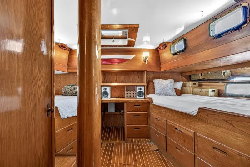 Slide: The Image of Interior of 1961 Vic Franck Custom yacht with wooden furnishings and twin beds. - 20