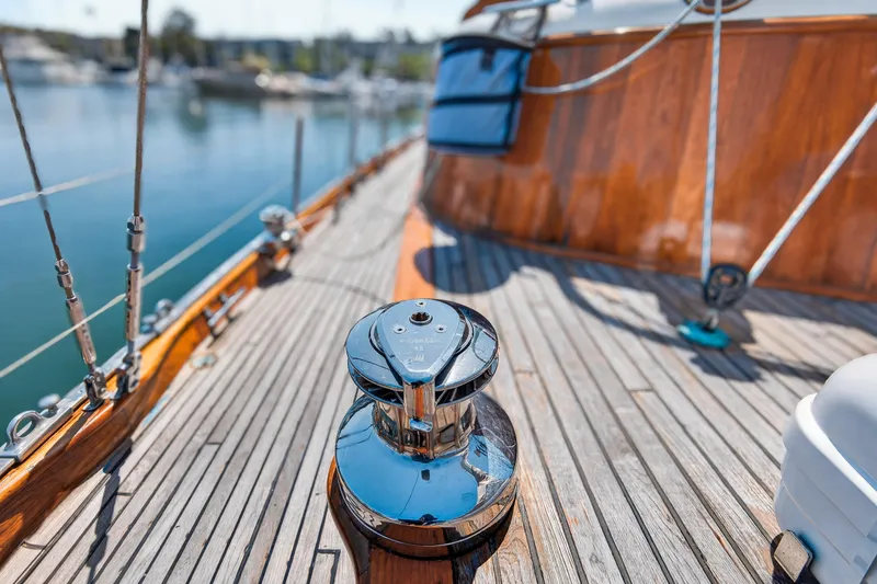 Slide: The Image of 1961 Vic Franck Custom yacht deck with polished winch and wooden finish. - 5
