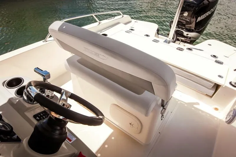 Slide: The Image of Manufacturer Provided Image: Boston Whaler 240 Dauntless 2020 boat interior with steering wheel and seating. - 12