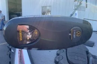 Slide: The Image of 2010 Nitro Z-7 boat with Terrova i-Pilot trolling motor, outdoor setting. - 3