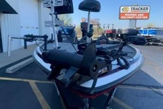 Slide: The Image of 2010 Nitro Z-7 fishing boat parked at dealership, featuring advanced equipment and sleek design. - 4