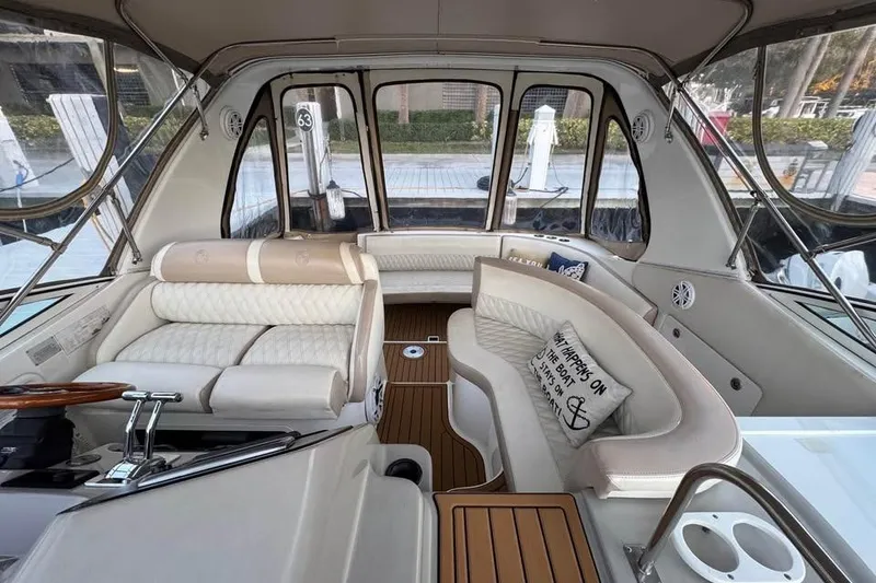 Slide: The Image of Luxurious interior of 2002 Cruisers Yachts 3575 Express with plush seating and elegant design. - 8