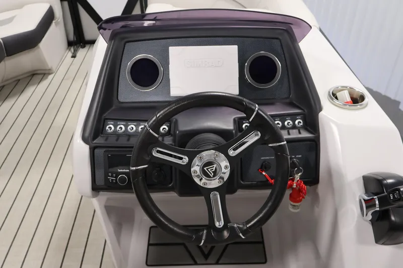Slide: The Image of 2021 Viaggio Diamante U boat dashboard with steering wheel and control panel. - 19