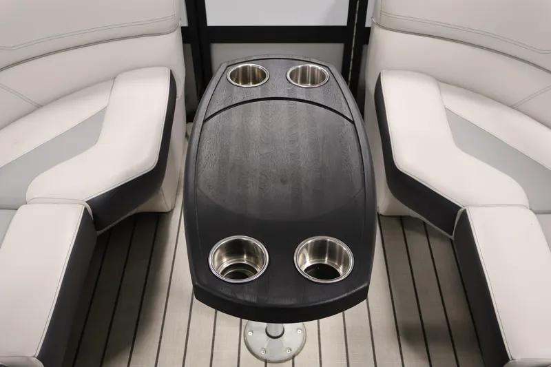 Slide: The Image of Luxurious Viaggio Diamante U 2021 boat interior with sleek seating and cup holders. - 36