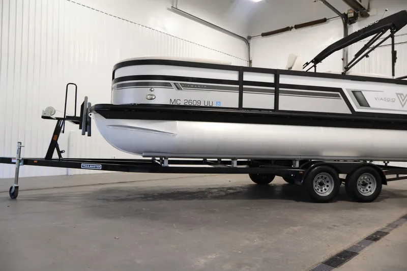 Slide: The Image of 2021 Viaggio Diamante U pontoon boat on a trailer in a garage setting. - 45
