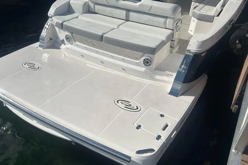 Slide: The Image of 2025 Regal LS36 boat with spacious swim platform and comfortable seating. - 15