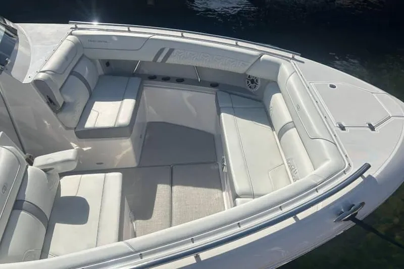 Slide: The Image of 2025 Regal LS36 boat interior with spacious seating and elegant design. - 16