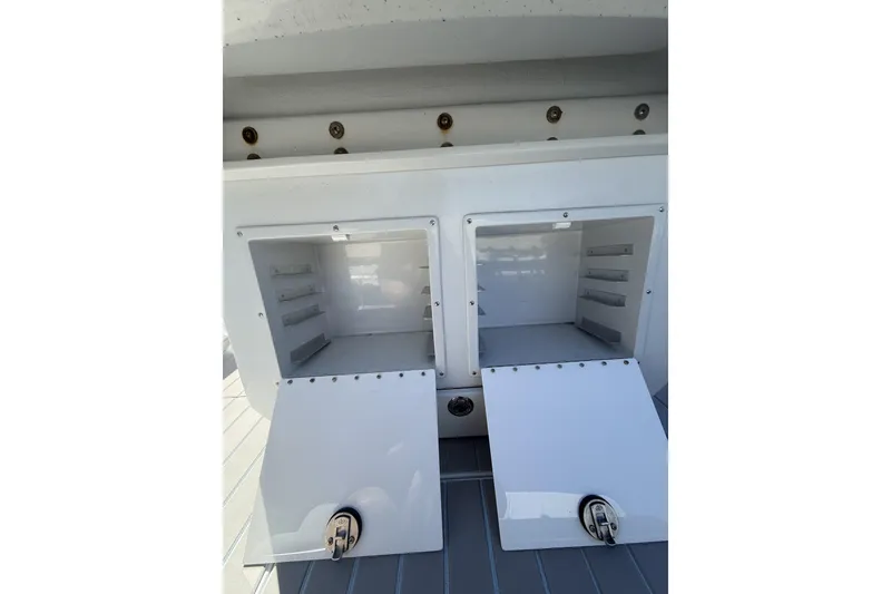 Slide: The Image of 2015 Conch 27 boat deck with sleek design and modern features. - 14