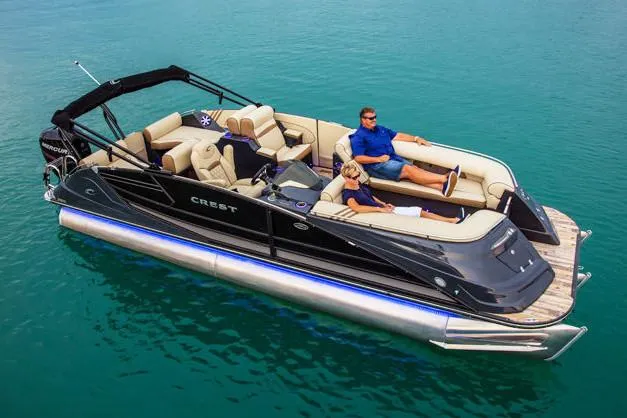 Slide: The Image of Manufacturer Provided Image: 2020 Crest Savannah 250 SLRC pontoon boat on clear blue water. - 12
