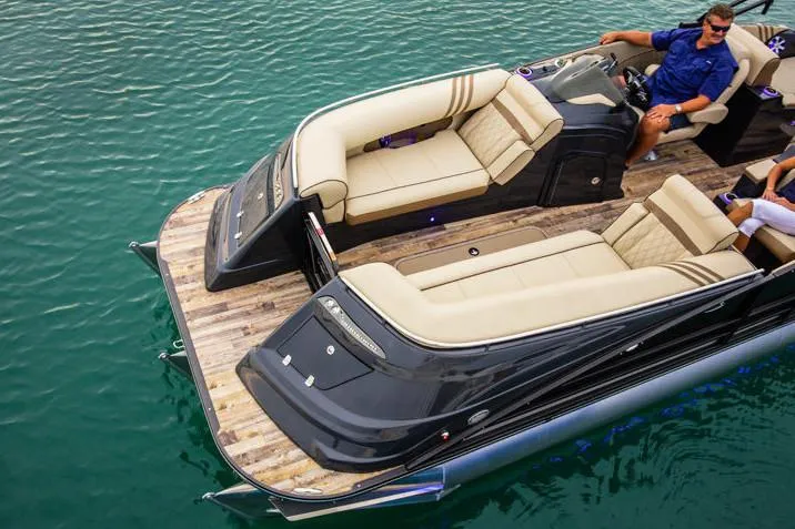 Slide: The Image of Manufacturer Provided Image: 2020 Crest Savannah 250 SLRC luxury pontoon boat with beige seating on clear water. - 15
