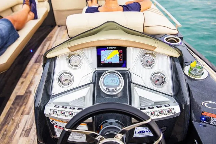 Slide: The Image of Manufacturer Provided Image: Dashboard of 2020 Crest Savannah 250 SLRC boat with navigation system. - 18