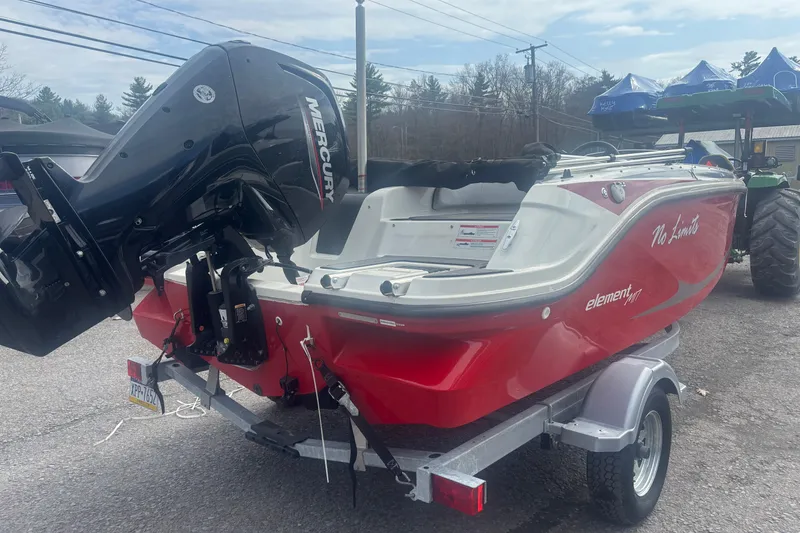 Slide: The Image of 2023 Bayliner Element E17 boat with Mercury engine on trailer. - 3