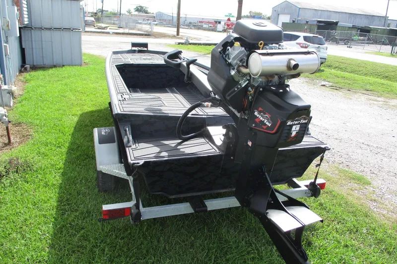 Slide: The Image of 2026 Gator Tail 1854 Extreme boat on trailer, featuring powerful engine and sleek design. - 3