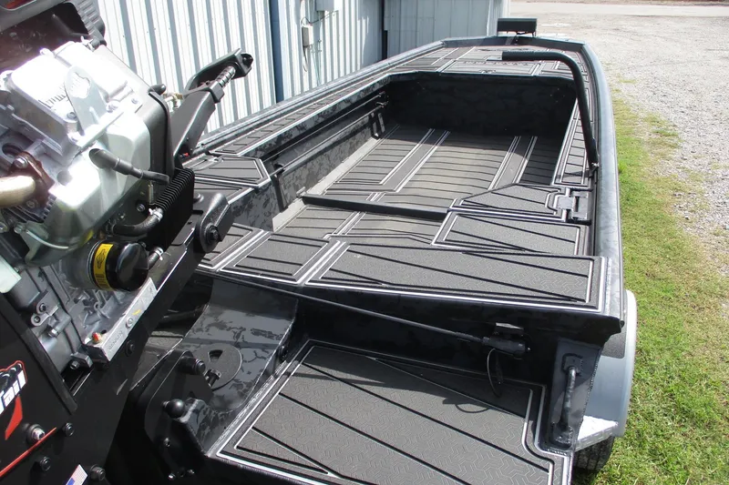 Slide: The Image of 2026 Gator Tail 1854 Extreme boat interior with sleek design and powerful engine. - 4